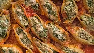 Soft pasta shells filled with creamy mixture of fresh spinach, mushroom, garlic and feta cheese