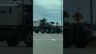 Huge SpaceX rocket booster crossing the road.