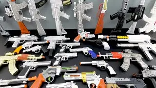 Massive Silver Toy Gun Collection! AK-47, M4, MP5, Revolvers, Desert Eagle & Rare Gold Rifle
