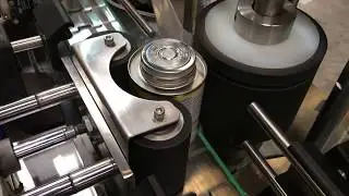 SOLVENT CEMENT TIN FULL WRAP STICKER LABELING MACHINE
