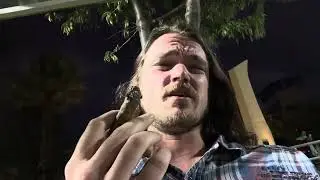 Smoking a cigar in the park