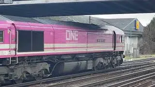 Pink Freightliner class 66 departing at Eastleigh