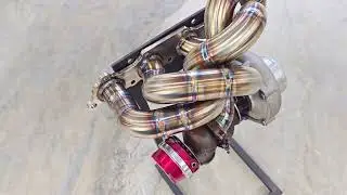 MITUBISHI EVO 4-9 LARGE RUNNER GARRETT G-SERIES VBAND TURBO MANIFOLD - WICKEDEP RACING 