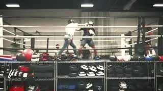 Bay Area Rapper turned Boxing Coach teaches Lesson to Street Fighter
