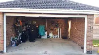 Conversion From Two Single Garage Doors To One Large Garage Door