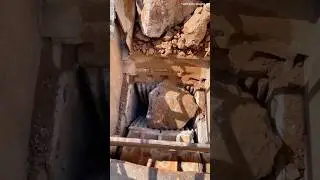 Watch a heavy crusher in action as it effortlessly crushes large stones into smaller pieces!
