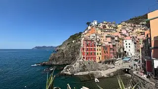 Hiking from Rionmaggiore to Manarola in a sunny spring Terra Cinque