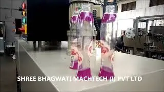 PET Empty Bottle PVC shrink label sleeve Tunnel with Rotating Puck and Conveyor