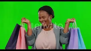 Black woman with shopping bag, excited and dancing on green screen, retail ther Video Footage Stock