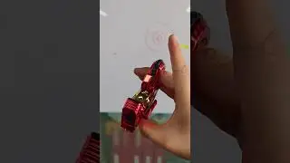 That sound is SO addictive! 👂 Red metal fidget toy review. #satisfying #toys #fidgettoysplus