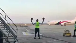 What is the work of Aircraft marshaler