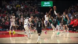 Caleb Love with two consecutive step back 3s in Bronny James' face