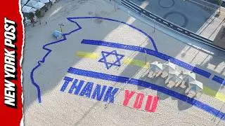Air Force One Flies Over Message Thanking Trump on Tel Aviv Beach