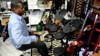 RODRIGUES MUSIC CENTER with JAMMIN PRO I ROCKER Drumset/Marlon Conradus.