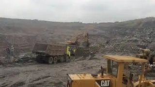 Heavy machinery working in coal mines in pandeswar, Overburden removal