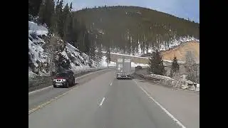 Suspense steep climbing to 11,000 ft elevation at Monarch Mountain pass US-50E, Colorado. 2106-02-21
