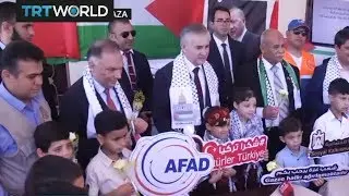 Gazans receivie humanitarian aid sent from Turkey
