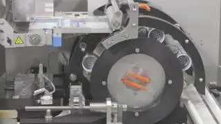 HERMA 242M S - Wrap-around labeller of jam capable cylindrical silicone cartridges