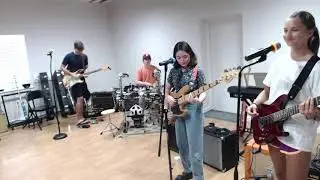 A Loud Mess rehearsing Sabotage