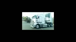 Kenworth K200 Big Cab backing into parking lot