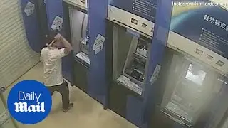 Shocking moment man smashes ATM machines with a hammer
