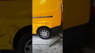 Fixing damaged van from accident.