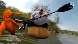 dolphin shoots fat guy in canoe