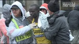 Boston Marathoners battle bone chilling cold with immense heart in 122nd race