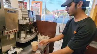 yafiz on the training Dunkin' Donuts !  Making Iced Mocha Latte