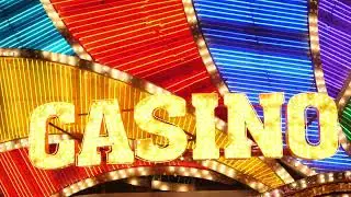 VideoVault Stock Video: Glowing casino sign in Las Vegas