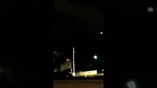 Torrington, CT 2022. large object sits motionless in the sky for a minute before slowly flying away.