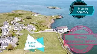 DJI Mini 2 flying over Moelfre Anglesey beautiful sunny day 4K.