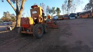 It Takes Two...to steer the Old As God road grader