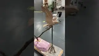 Step 12 sculptor Benjamin Victor creating a sculpture of a Peregrine Falcon. Clay process.