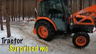 Tractor Tries to Wheelie While Winching Trees