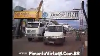 Retirando placa irregular no centro de Pimenta Bueno - RO