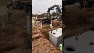 Installing the Grease Trap | Shops at Theis & Cherry &ndash; Tomball TX Development