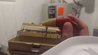 antique fishing lures found in old tackle box