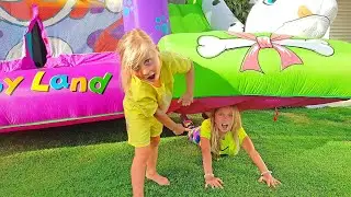 Kids pretend play hide and seek and jump on the trampoline