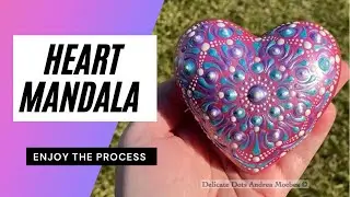 Metallic pink dot mandala stone painting on a plumpy heart.