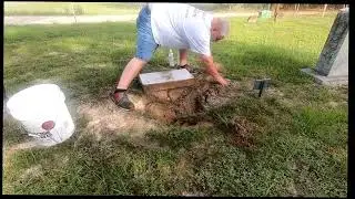 Raising up Veteran John Wayne Newcomb Headstone.