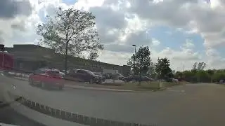 Car drives over curb