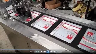 friction feeder with vacuum conveyor for cartons