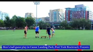 Men's ball game play at Canoe Landing Park, Fort York Blvd  Toronto