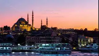 Timelapse view of Istanbul cityscape with Suleymaniye mosque with tourist ships floating at