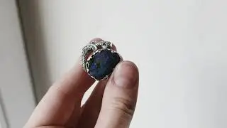 Octopus ring with a boulder opal