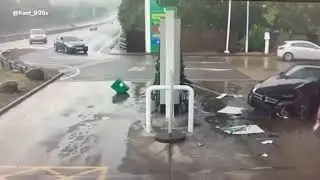 Mercedes driver loses control and crashes into petrol station