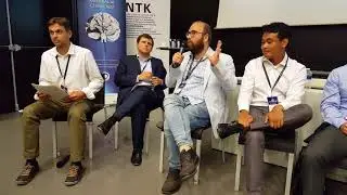 Alexey Turchin and Tyson Barker at the AI Race & Societal Impacts panel at HLAI 2018