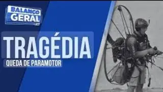 Paramotor ca&iacute; no mar de ilha comprida 