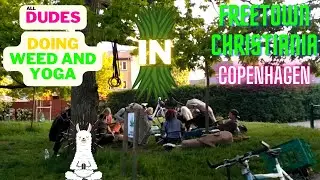 Dudes Are Relaxing On A Yoga Rastaman Glade In Christiania, Copenhagen, Denmark.